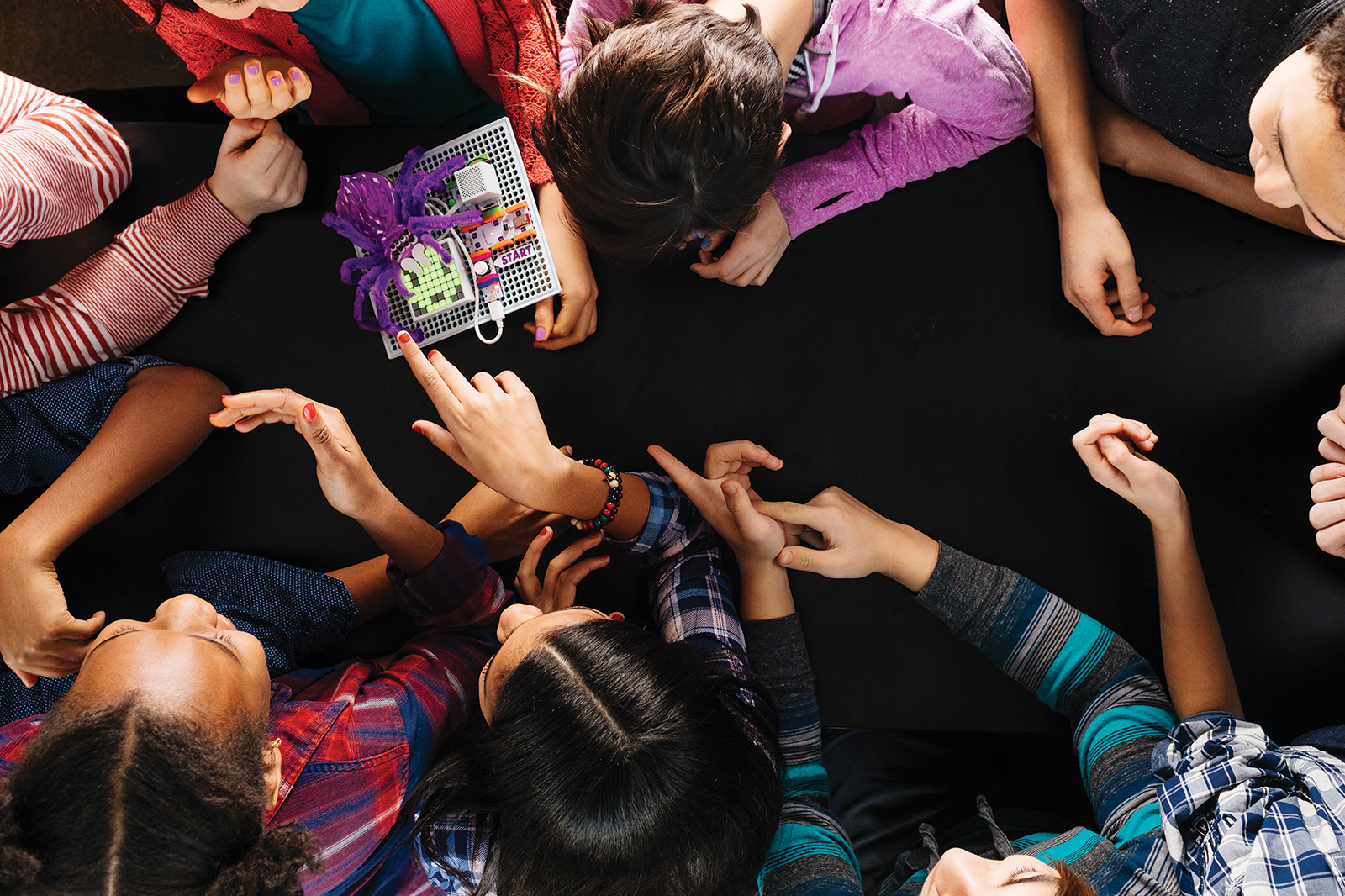 Kids practice computational and design thinking by playtesting and remixing their inventions.